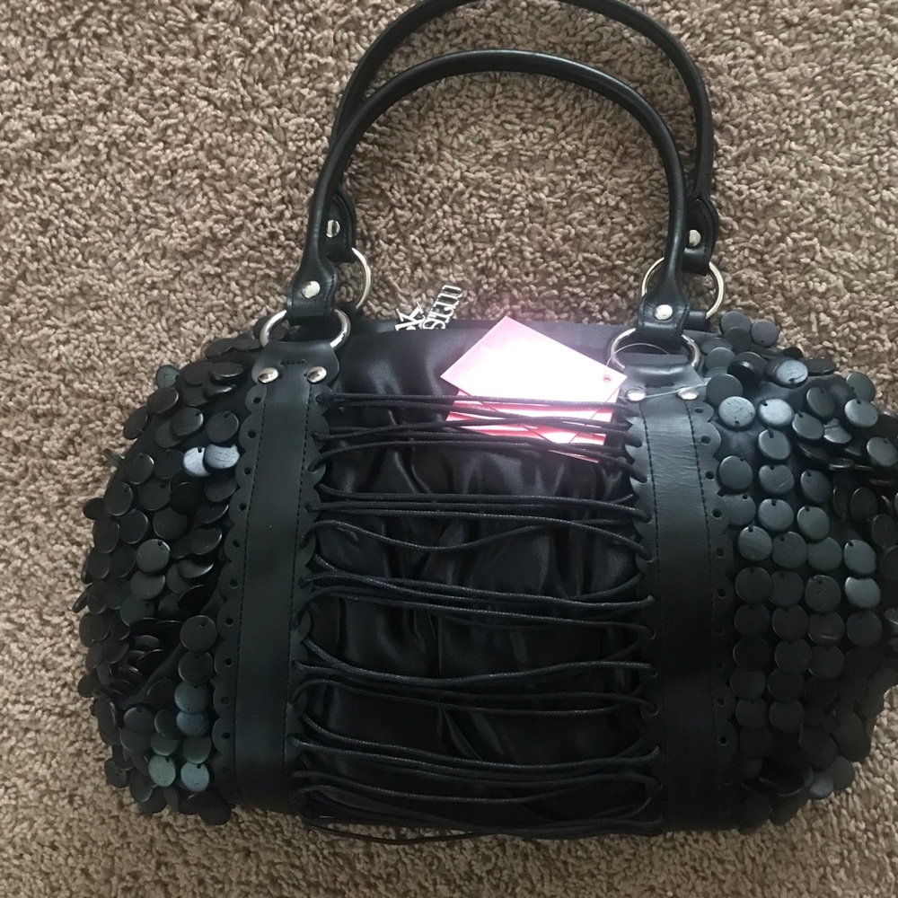 Charm and luck handbag